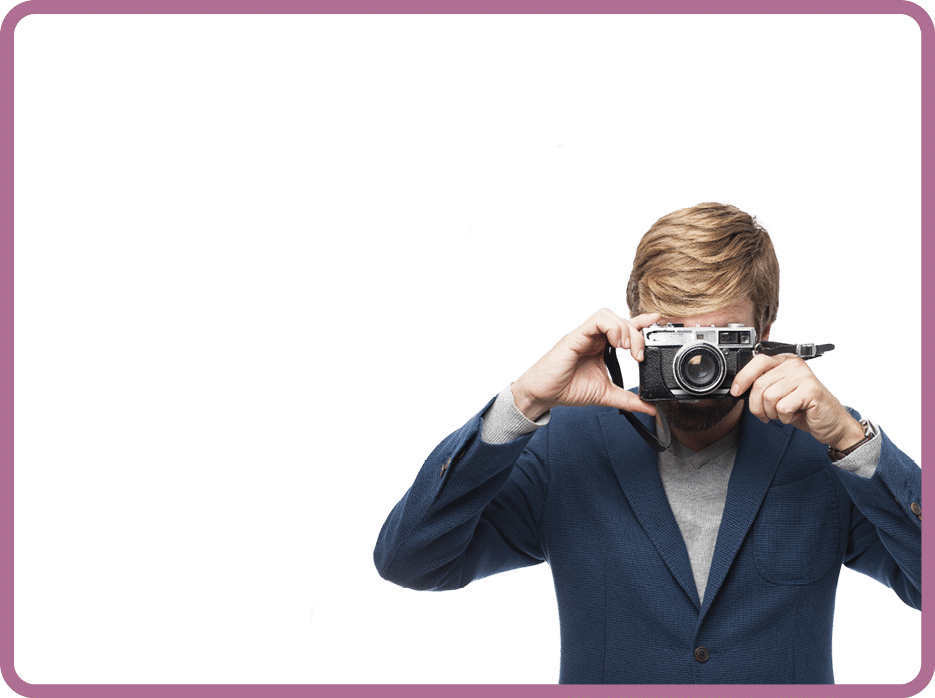 happy businessman with camera